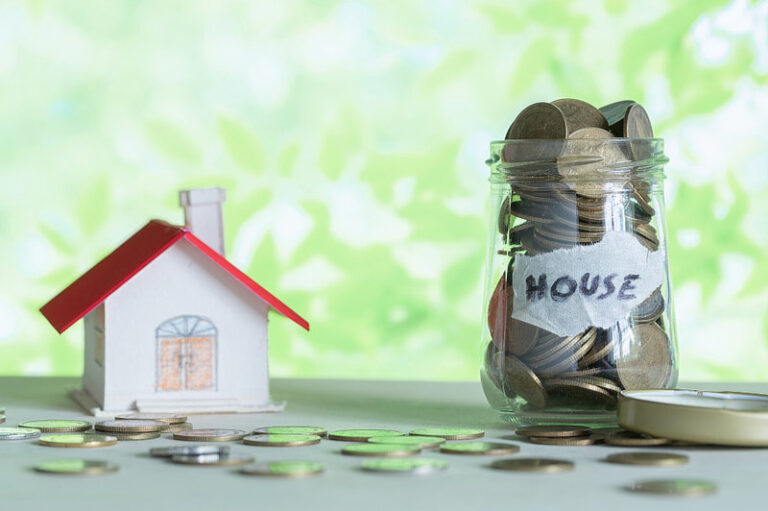 Money saving for house in the glass bottle.